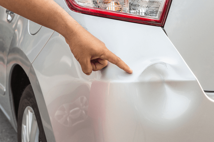Auto body repair dented bumper